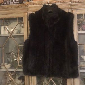 Beautiful L black fur vest in perfect condition